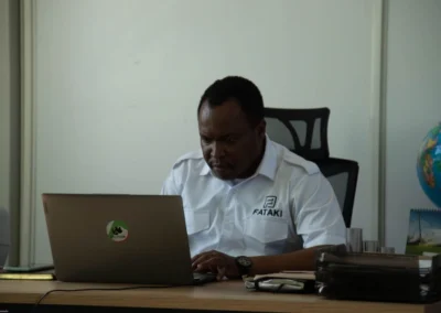 Philip Mambo on Laptop